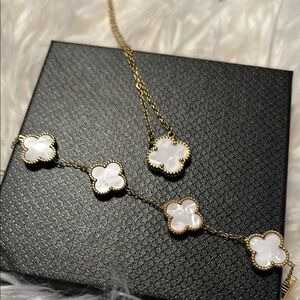 Elegant Gold and White Clover Necklace and Bracelet